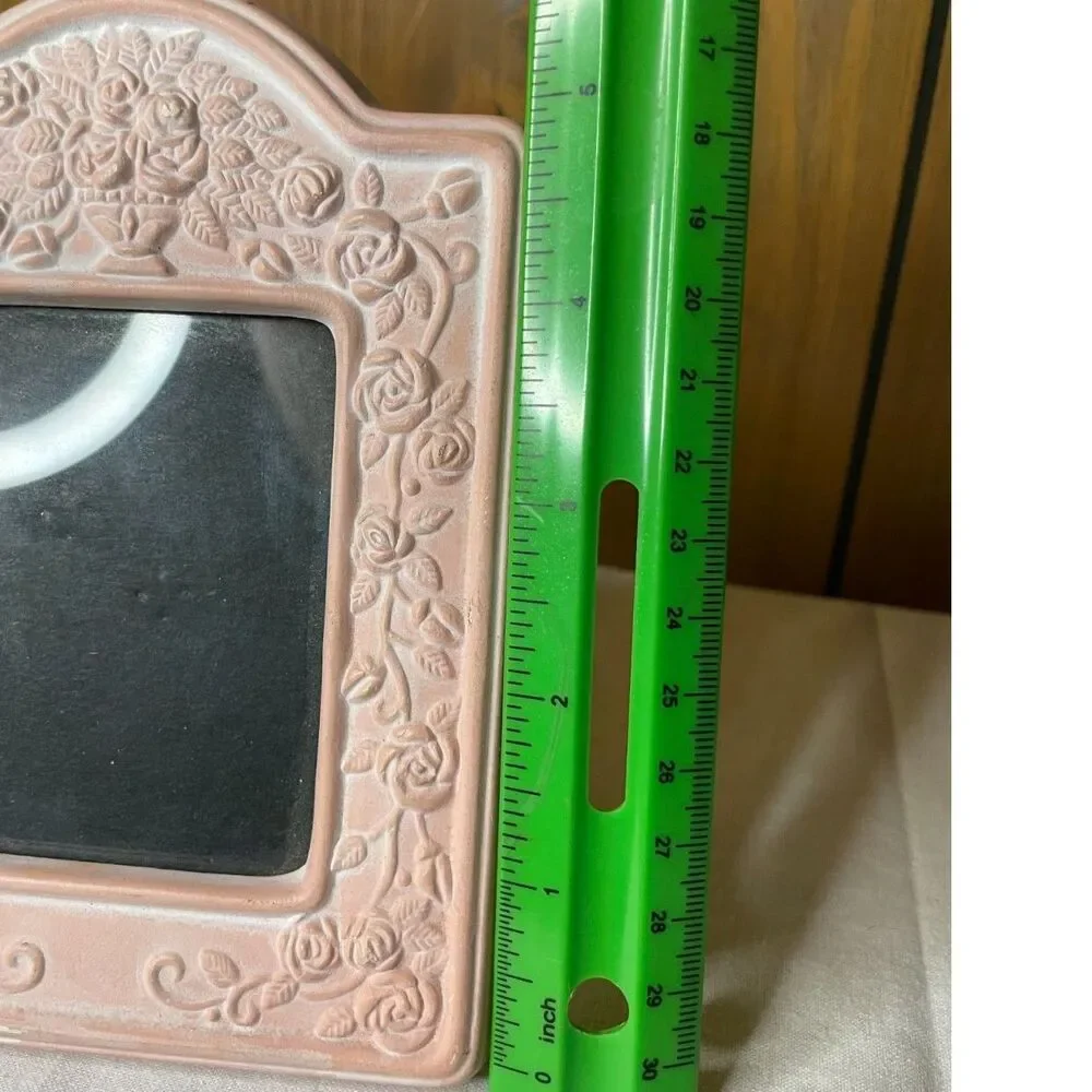 Pink ceramic and terracotta-style picture frame